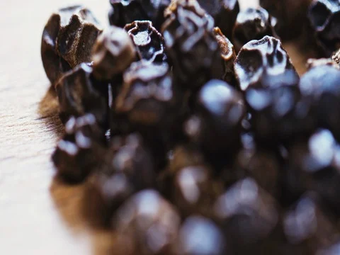 Macro allspice on wooden background Stock Footage 73554988