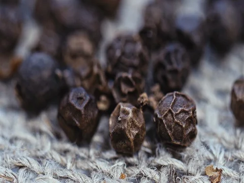 Macro allspice on wooden background Stock Footage 73555041
