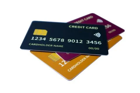 Macro angled cluster of overlapping multi-colored credit and debit cards on.. Stock Photos