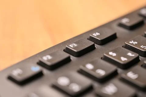 Macro Angled Top View Black Computer Keyboard Highlighting F3 Function Key .. Foto stock