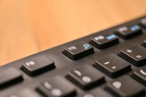Macro Angled Top View Black Computer Keyboard Highlighting F9 Function Key .. Stock Photos