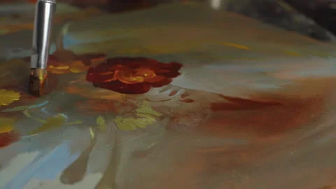 Macro, artist's brush makes neat strokes of oil paint on a painting with painted Stock Footage 258859403