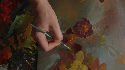 Macro, artist's brush makes neat strokes of oil paint on a painting with painted Stock Footage 268621024