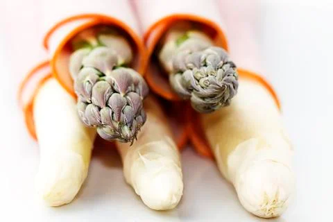 Macro asparagus tips ham Stock Photos