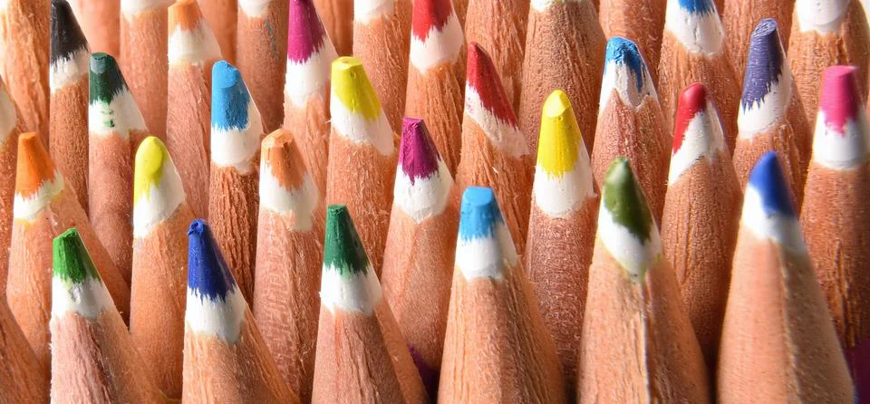 Macro background of a pattern of crayon tips Stock Photos