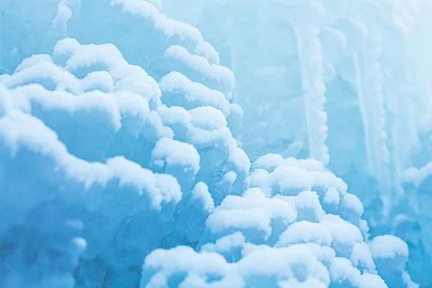 Macro background of snow and icicles. Close-up winter landscape Stock Photos