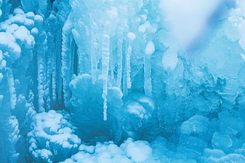 Macro background of snow and icicles. Close-up winter landscape Stock Photos