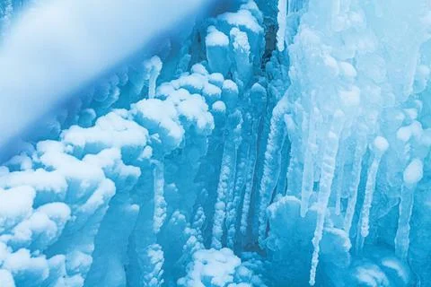 Macro background of snow and icicles. Close-up winter landscape Stock Photos