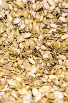 Macro background texture of green pumpkin seeds Stock Photos