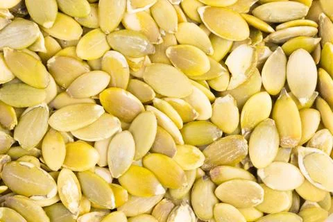 Macro background texture of pumpkin seeds Stock Photos