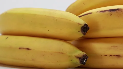 Macro banana peel texture with brown spots, natural ripe fruit detail 스톡 동영상 331319334