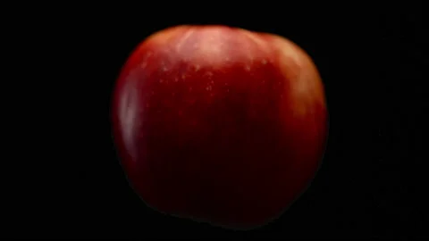 Macro, beautiful red apple on a black background Stock Footage 171994346