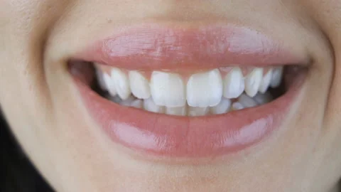 Macro of beautiful smile and white teeth  Stock Footage