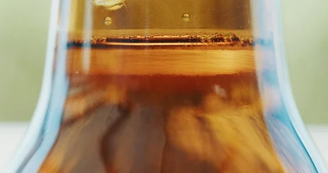 Macro Beer Bottle Bubbles Floating Slowly Upwards 4K Stock Footage 110571538