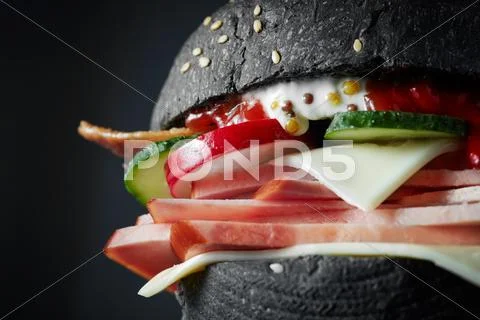 Macro Black burger Stock Photos