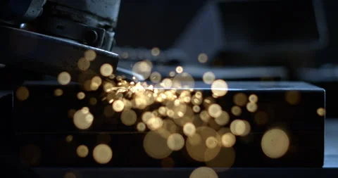 Macro of blacksmith welder smooths metal steel with angle grinder with sparks Stock-Footage 269941275