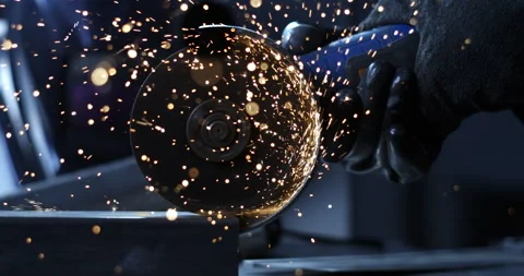 Macro of blacksmith welder smooths metal steel with angle grinder with sparks Stock Footage 270045280