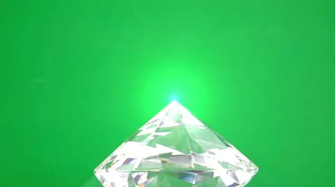 Macro of blue diamond motion rotation with glowing rays. HD Video Clip Stock Footage 62133763