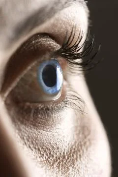 Macro on blue eye Stock Photos