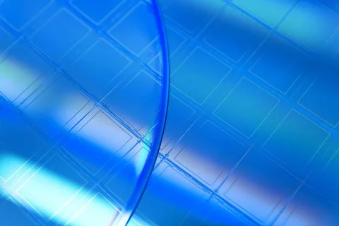 Macro of blue silicon wafer with microchips. Stock Photos