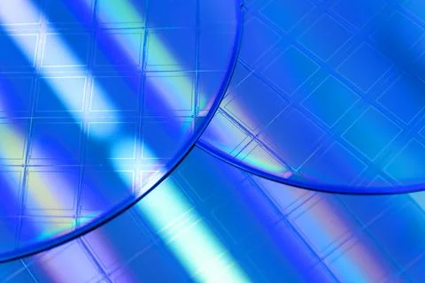 Macro of blue silicon wafer with microchips. Stock Photos