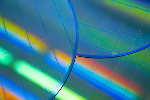 Macro of blue silicon wafer with microchips. Stock Photos