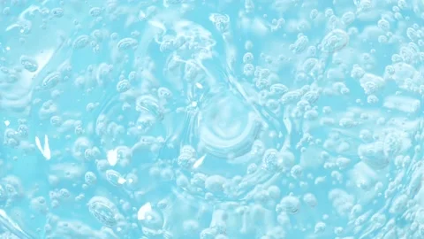 Macro blue transparent cosmetics serum gel, cream, fluid lotion texture, bubbles Stock Footage 200929291
