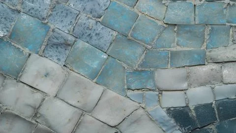 Macro of blue white and turquoise glass mosaic with wavy pattern Stock Photos