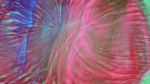 Macro bokeh of glittering particles shimmering in abstract fluid motion Видео 331658663