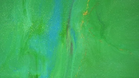Macro bokeh of glittering particles shimmering in abstract fluid motion Stockbeeldmateriaal 331660624