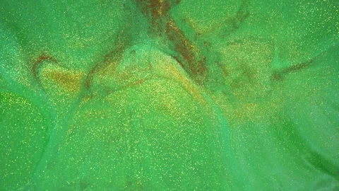 Macro bokeh of glittering particles shimmering in abstract fluid motion Stock Footage 331660904