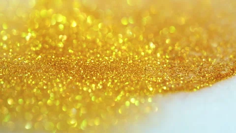 Macro bokeh of shimmering glitter particles in vibrant fluid motion Stock Footage 331741425