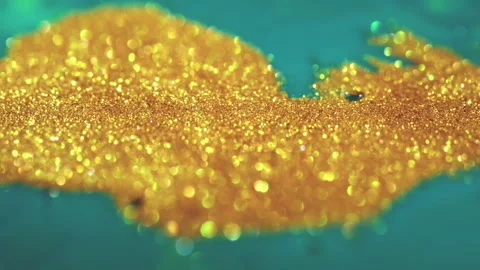 Macro bokeh of shimmering glitter particles in vibrant fluid motion Stock Footage 331745294