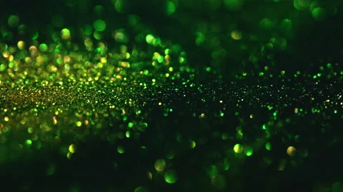Macro bokeh of shimmering glitter particles in vibrant fluid motion Stock Footage 331749886