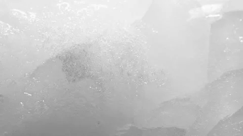 Macro breaking ice texture with splashing water surface, ripples and bubbles Stock Footage 231665346