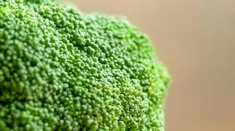 Macro of broccoli veggie being washed with squirts of water shot in slow moti Stock Footage 62715200