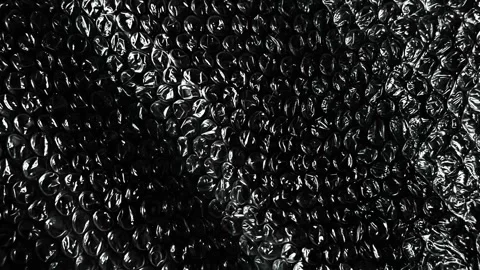Macro Bubble Wrap Plastic Texture Background Animation Transparent Packaging Stock Footage 339028801