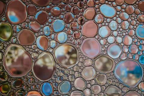 Macro bubbles abstract background. Glass surface with rain drops. Stock Photos