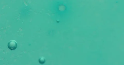 Macro Bubbles moving in green/blue atmosphere 21b 스톡 동영상 188416730
