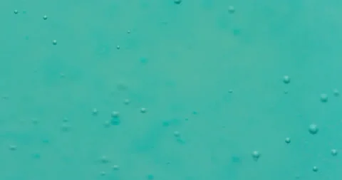Macro Bubbles moving in green/blue atmosphere 21b 스톡 동영상 188419306