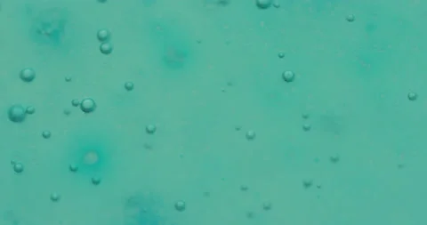 Macro Bubbles moving in green/blue atmosphere 17a 스톡 동영상 188433608