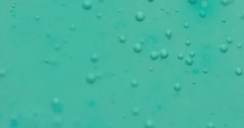 Macro Bubbles moving in green/blue atmosphere 18a 스톡 동영상 188434546