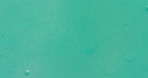Macro Bubbles moving in green/blue atmosphere 20b 스톡 동영상 188435506