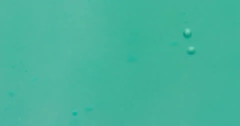 Macro Bubbles moving in green/blue atmosphere 21a 스톡 동영상 188447118