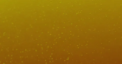 Macro Bubbles moving in yellow/orange atmosphere 2 스톡 동영상 188412643