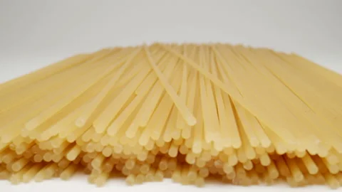 MACRO: Bunch of spaghetti on a white background, Dolly shot Stock Footage 166027645