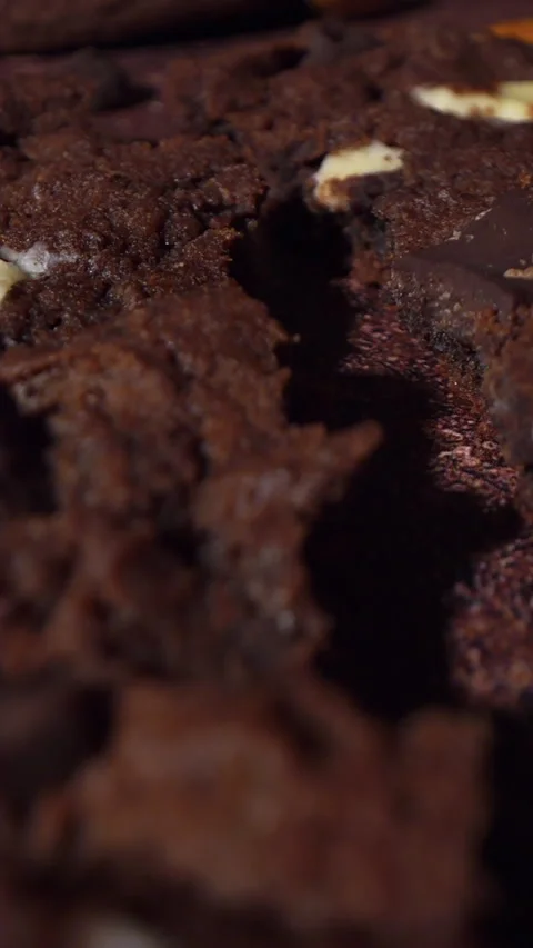 Macro Camera Move Across Cracked Chocolate Cookie Showing Baked Surface Texture Stock Footage 331982023