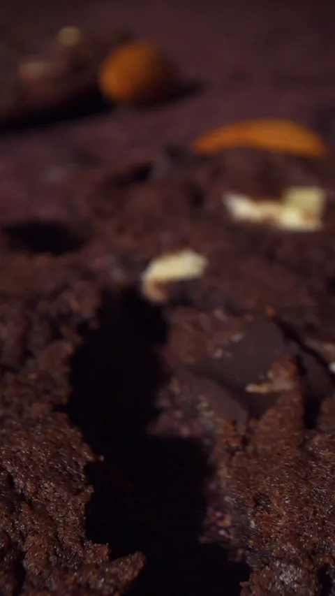 Macro Camera Move Through Cracked Chocolate Cookie Showing Soft Baked Texture Stock Footage 331981825