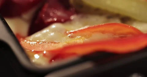 Macro camera movement on a dish in a restaurant. fry raclette on the table Stock Footage 179026279