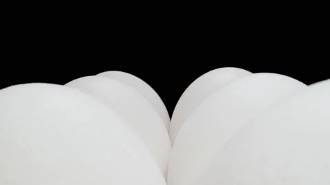 MACRO: Camera moves between rows of fresh white chicken eggs Stock Footage 145825783